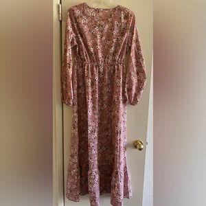 Maxi floral dress. Size L but it fits small or medium. New with plastic bag